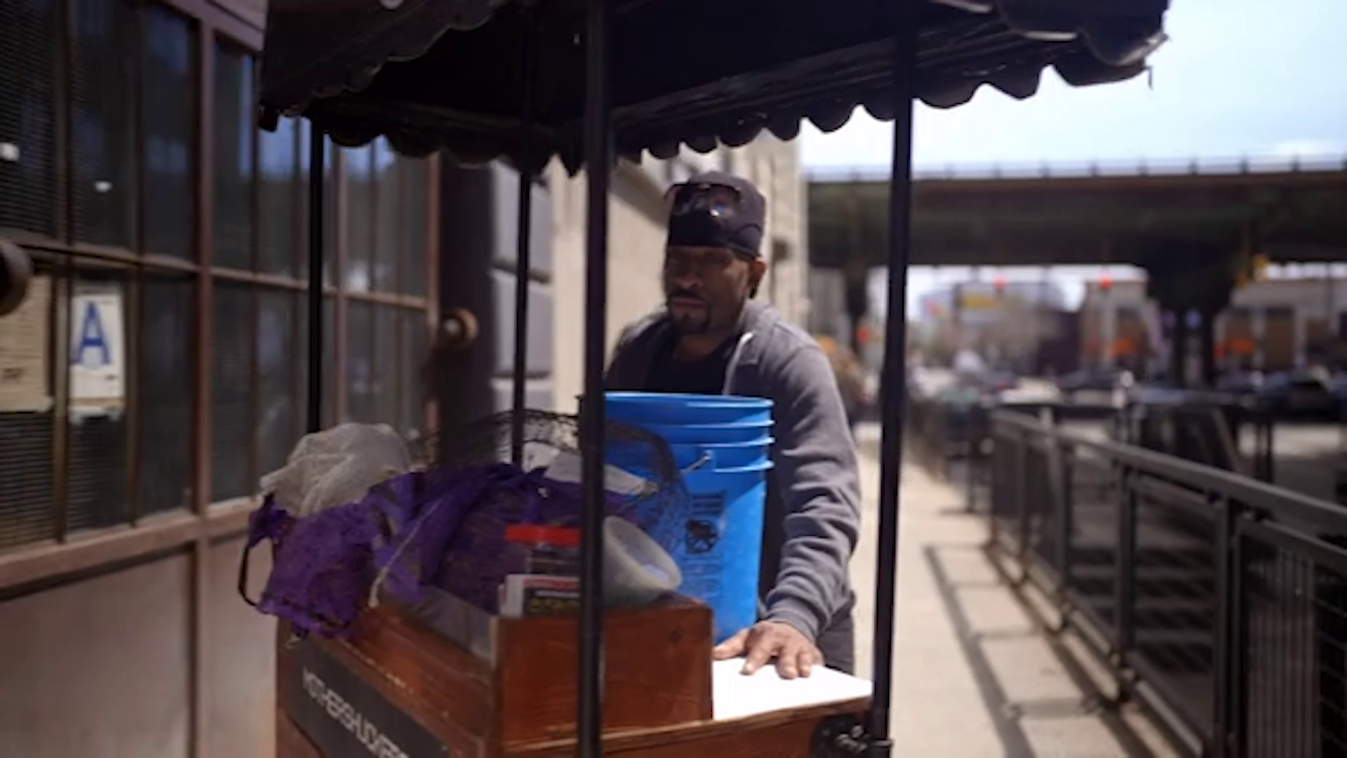 a man with an oyster cart